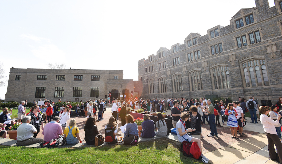 prospective students and families enjoying lunch outdoors on campus
