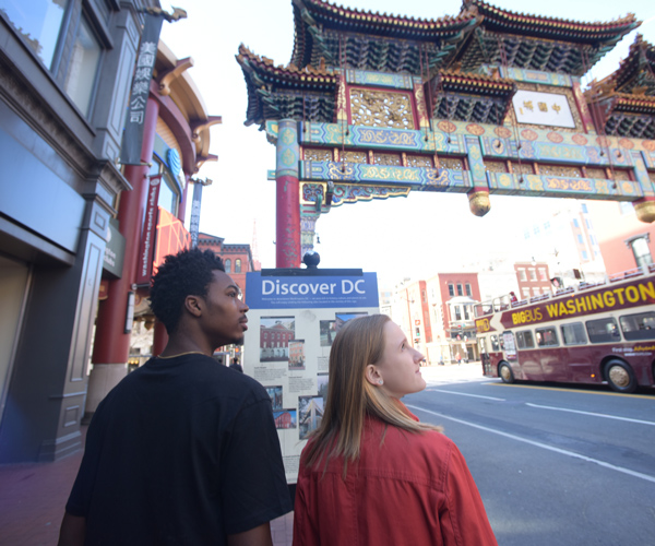 Two students on street in Chinatown