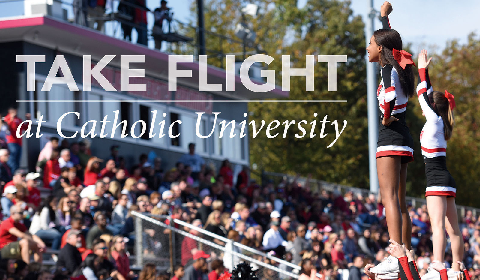Cheerleaders leading crowd in cheer. Text on image reads Take Flight at Catholic University