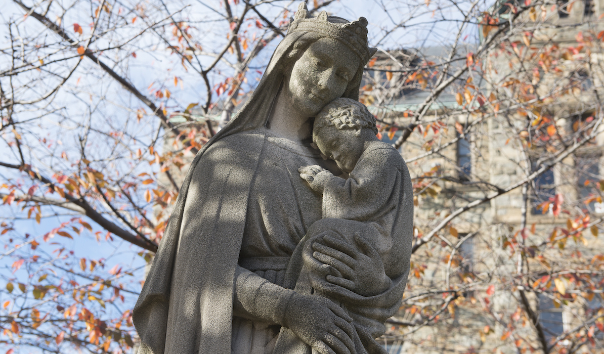 statue of Mary and Jesus on campus