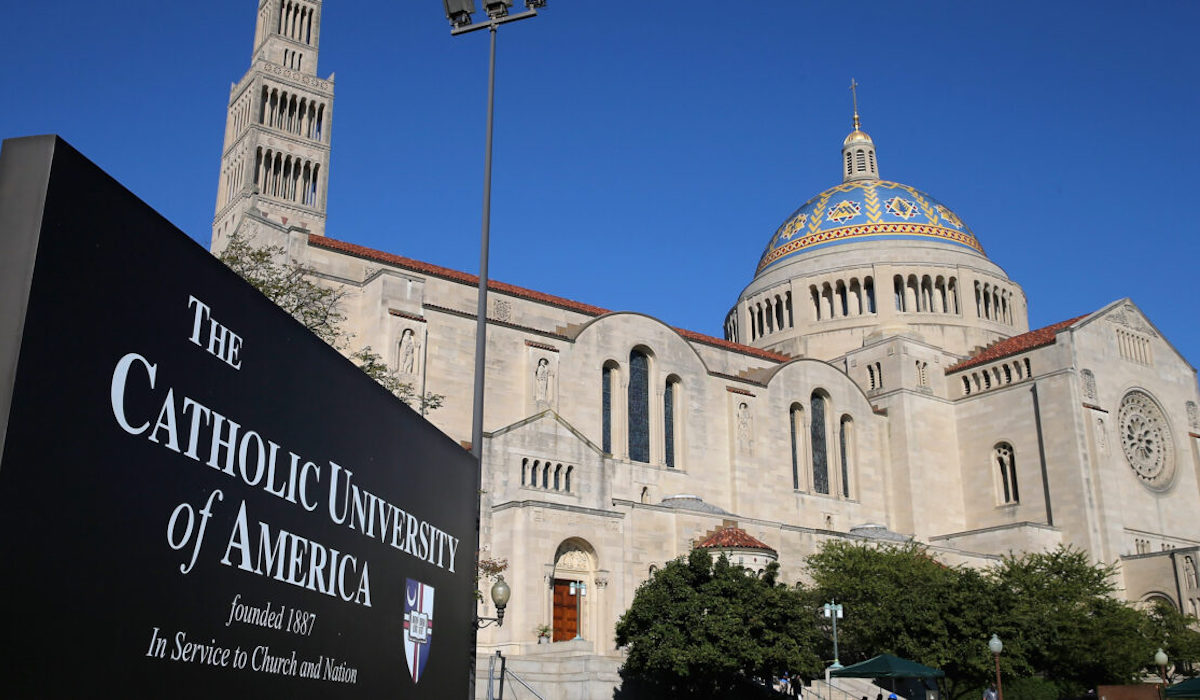 Basilica of the National Shrine of the Immaculate Conception with the CUA welcome sign in front