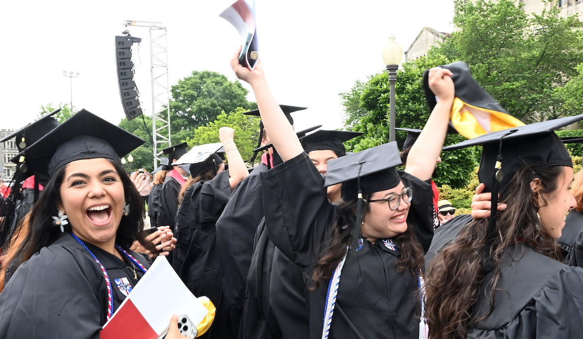 students celebrating at commencement