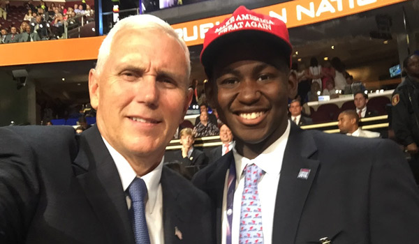 Isaiah Burroughs with Gov. Mike Pence