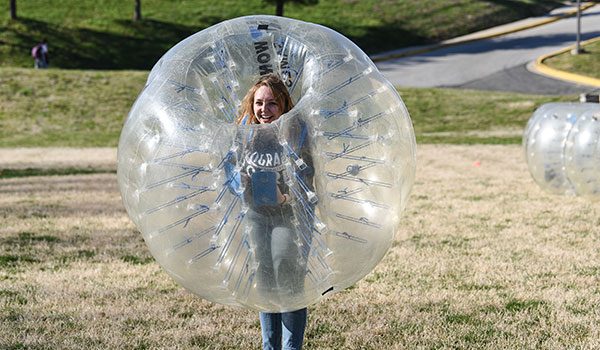 Mary Schmitt playing bubble soccer as part of a Program Board event