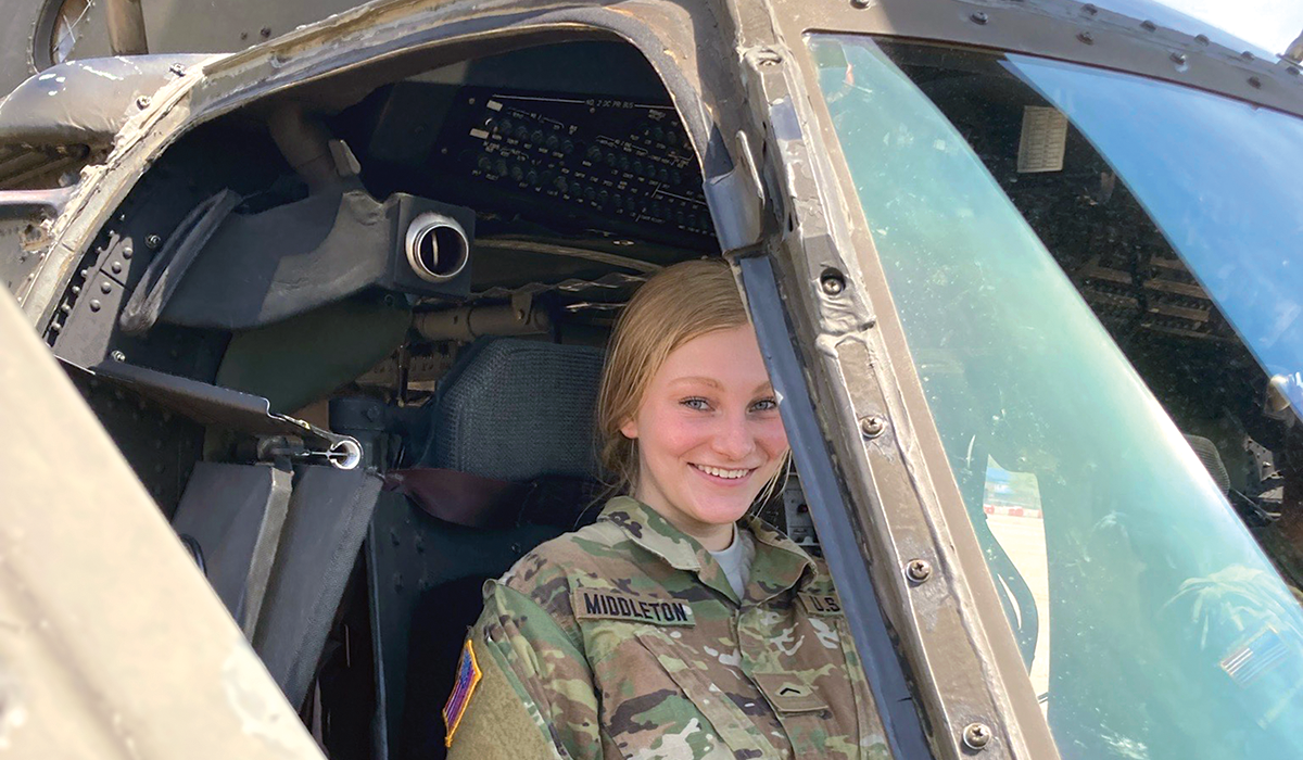 Janae Middleton in a helicopter in her army uniform