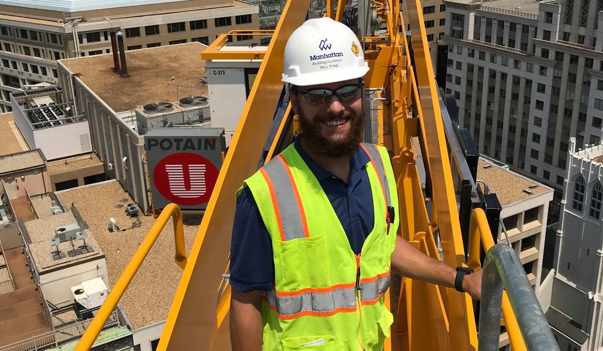 Will Pyne with hardhat on crane 