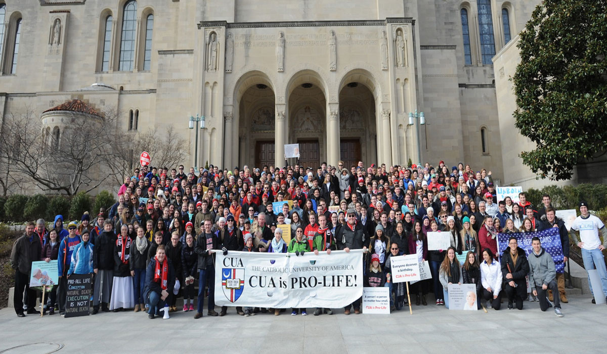 CUA students in front of the Basilica