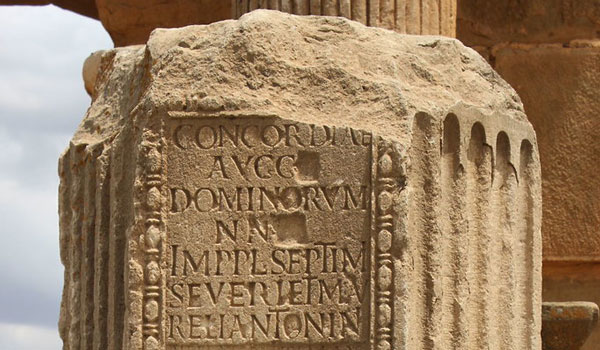 Image of ancient text carved into a pillar.