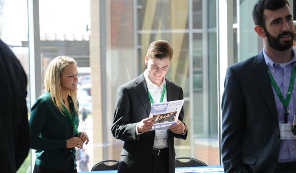 Catholic University students at a professional networking event.
