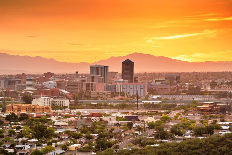 Tucson skyline at sunset with mountains in the background