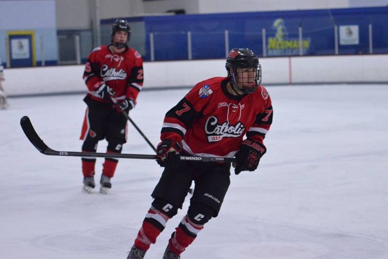catholic university ice hockey team playing