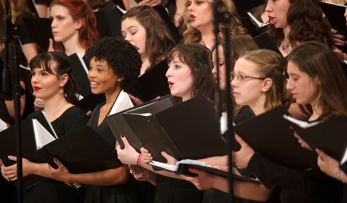Catholic University choir singing at the annual Christmas concert